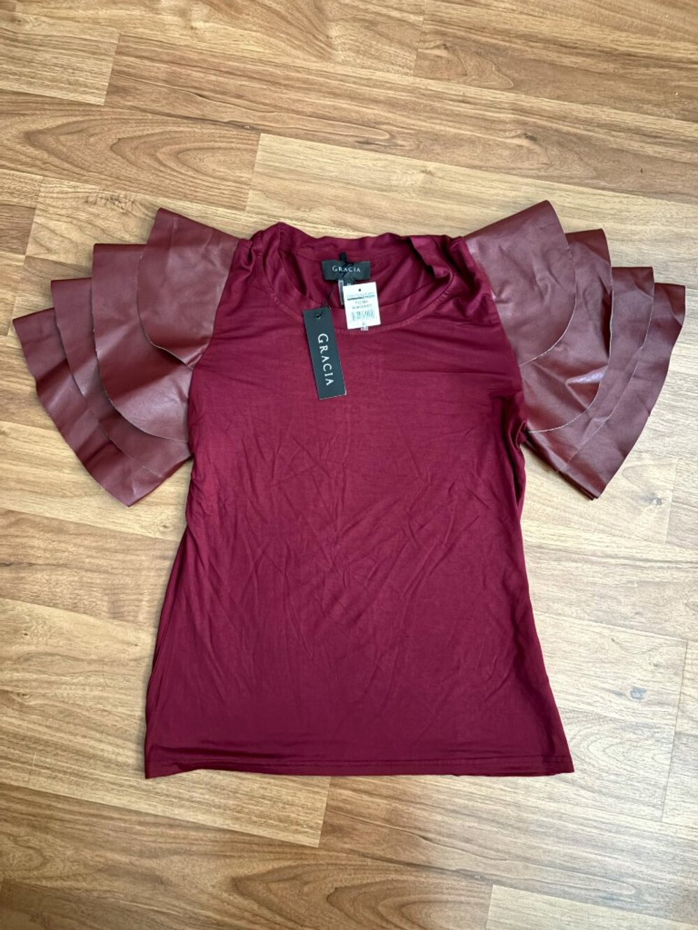 Gracia burgundy top with faux leather tiered ruffled sleeves, size women's M NWT